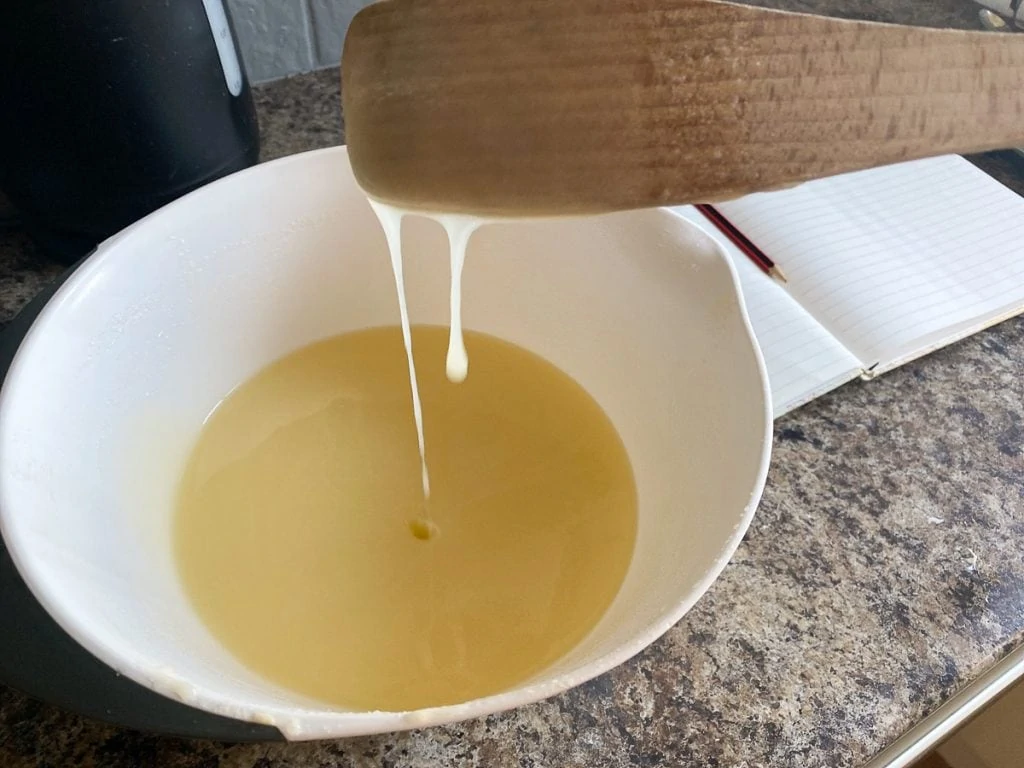 Melted sugar, butter, and milk in a bowl