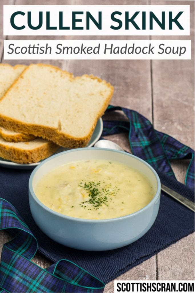 Cullen Skink Recipe - Traditional Scottish Smoked Fish Soup - Cullen Skink in a bowl with spoon and crusty bread