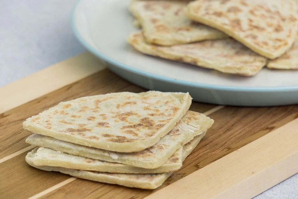 Traditional Scottish Tattie Scones Recipe presented on chopping board and plate