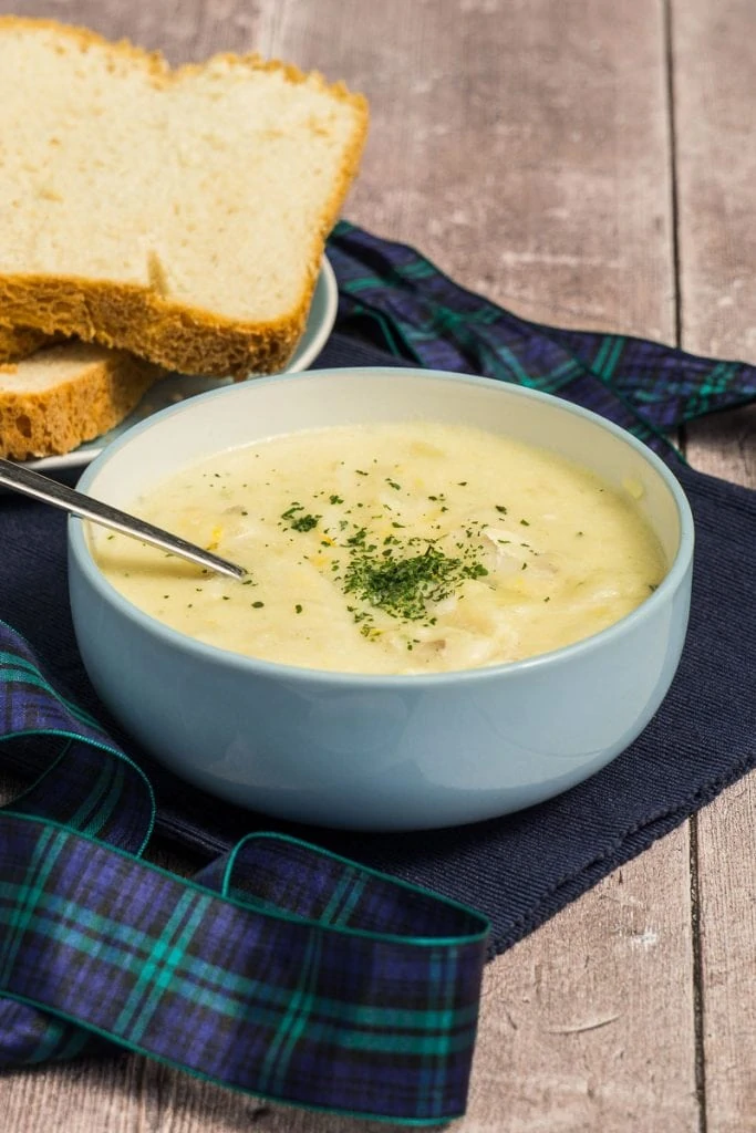 Cullen Skink Soup Recipe - Soup in a bowl with bread