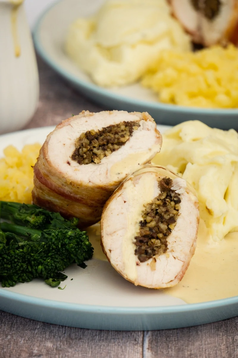 Balmoral Chicken Recipe - Chicken Stuffed with Haggis on plate with vegetables