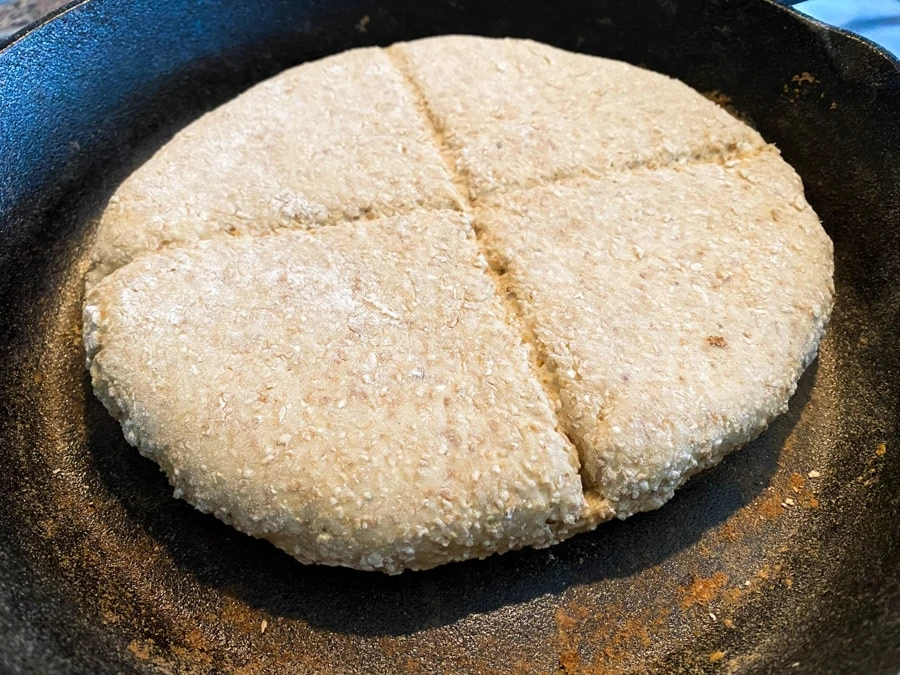Bannock cooking in a skillet