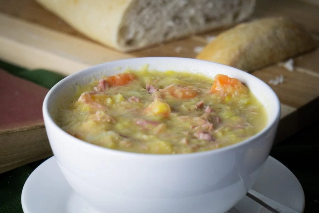 Scottish Lentil soup with ham in a bowl with bread