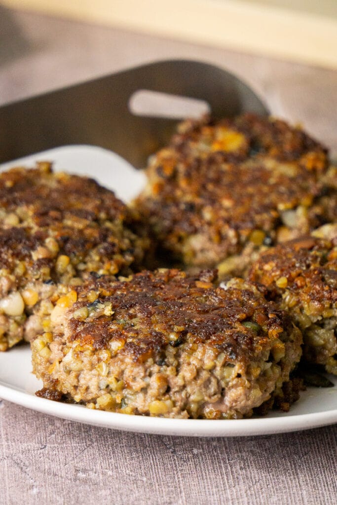 Cooked Haggis Burger Patties on a plate