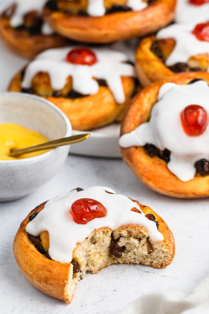 Homemade Belgian Buns Recipe with a bite out of one