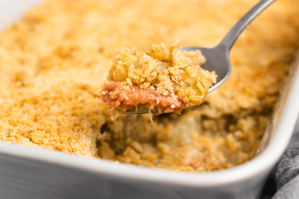 Rhubarb and Pear Crumble Recipe -showing the crumble cooked on a serving spoon