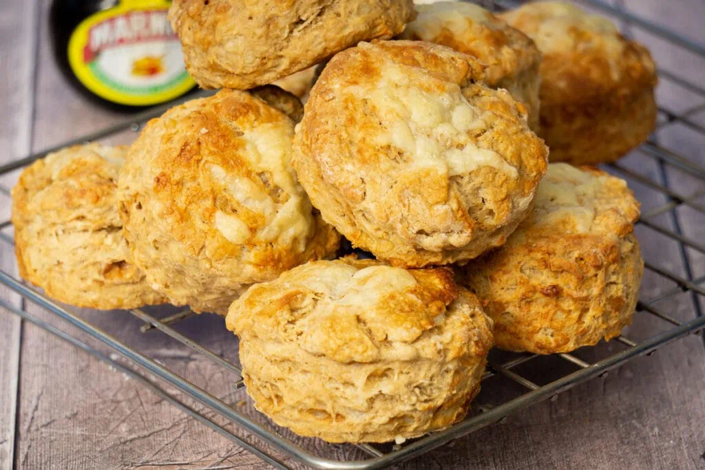 Cheese and Marmite Scones Recipe -  Scones piled on a wire rack