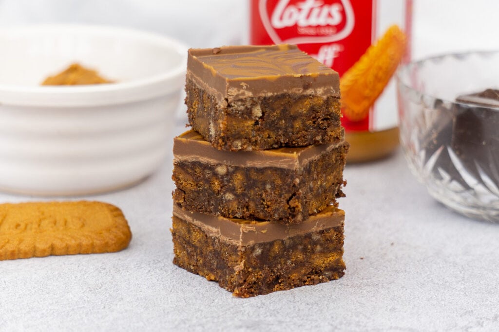 Biscoff Tiffin Recipe -  three slices stacked