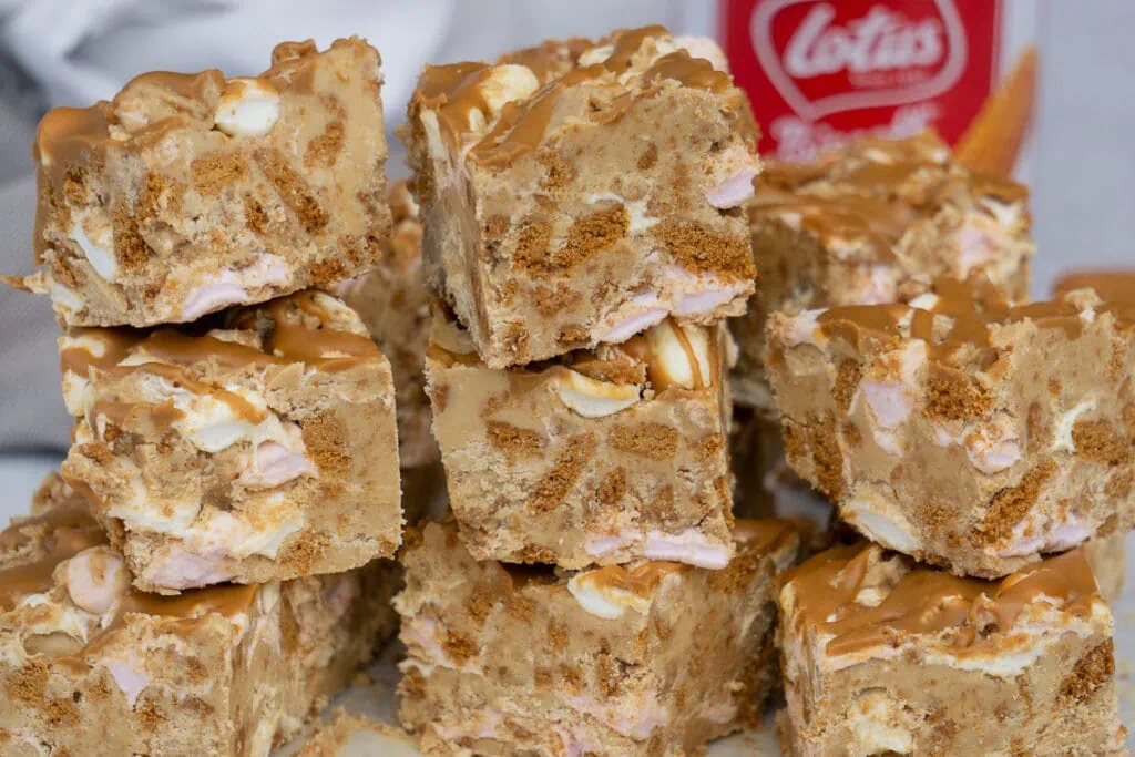 Biscoff Rocky Road Recipe - piled with spread in the background
