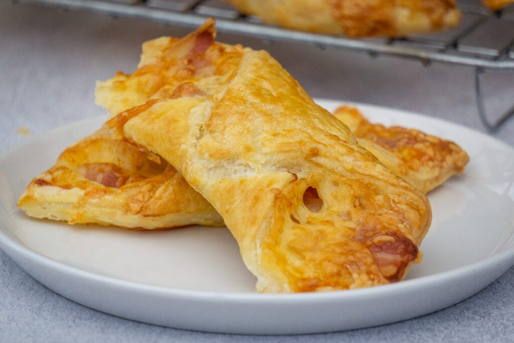 Cheese and bacon turnovers ready to be eaten