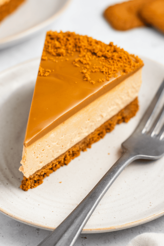 Lotus Biscoff Cheesecake - one slice on a plate with fork