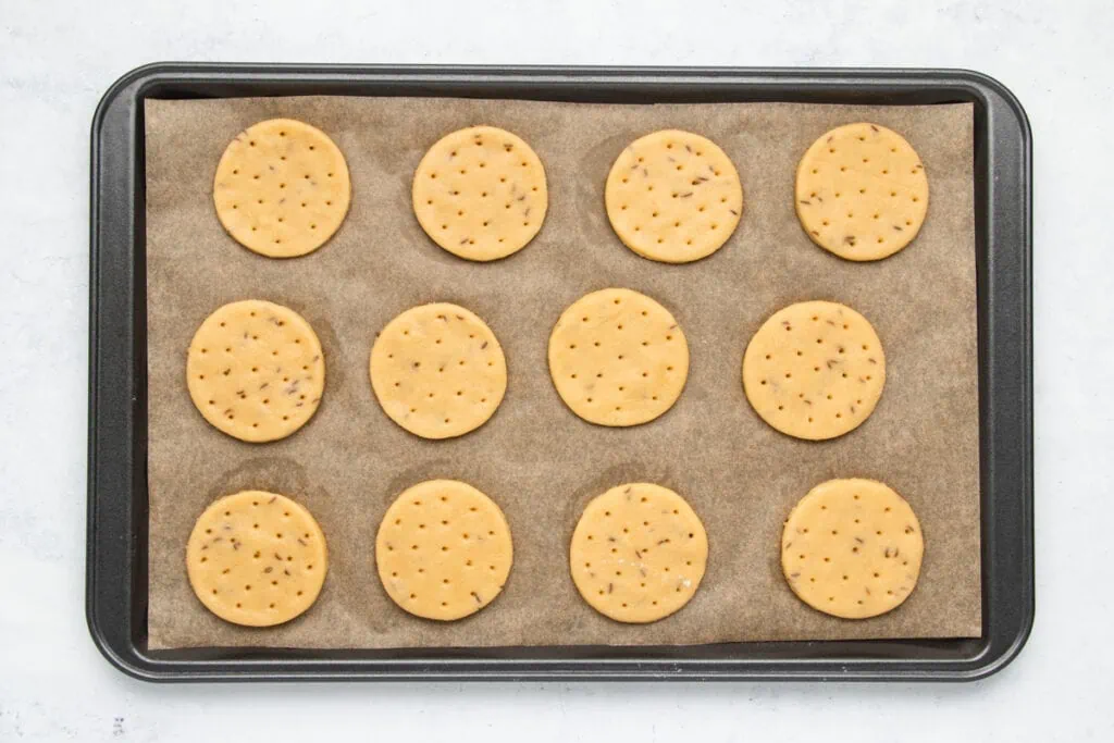 Abernethy Biscuits Recipe Method - uncooked biscuits on a tray with pricked holes
