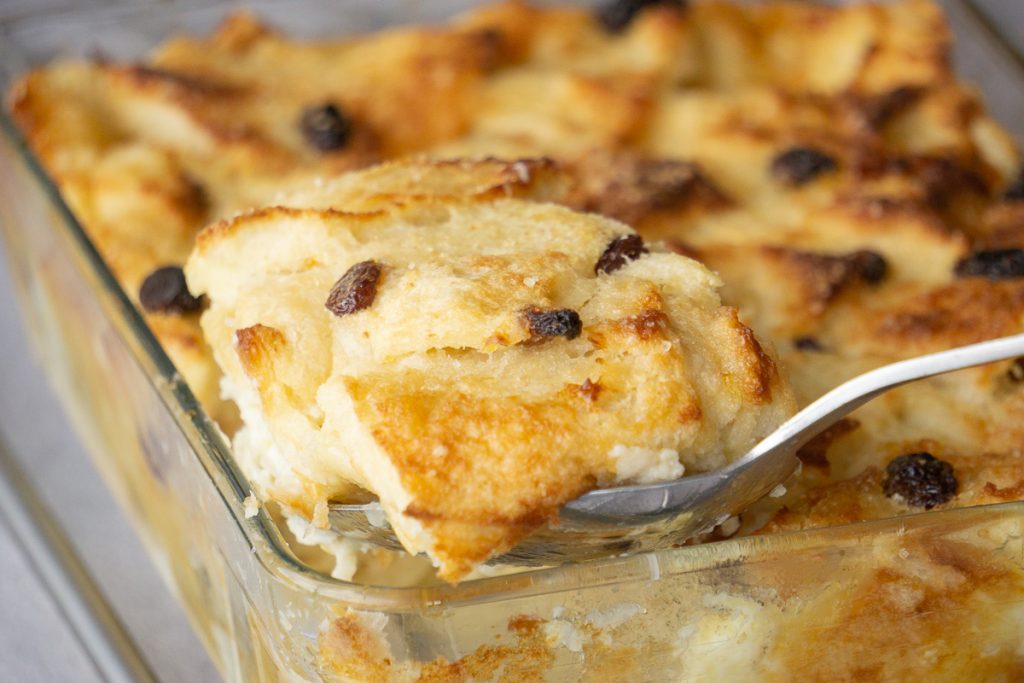 Marmalade Bread and Butter Pudding Recipe with a spoon taken out
