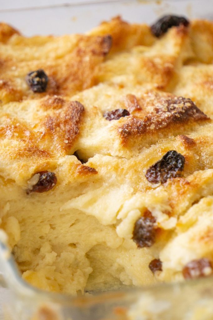 Marmalade Bread and Butter Pudding with a spoonful taken out. 