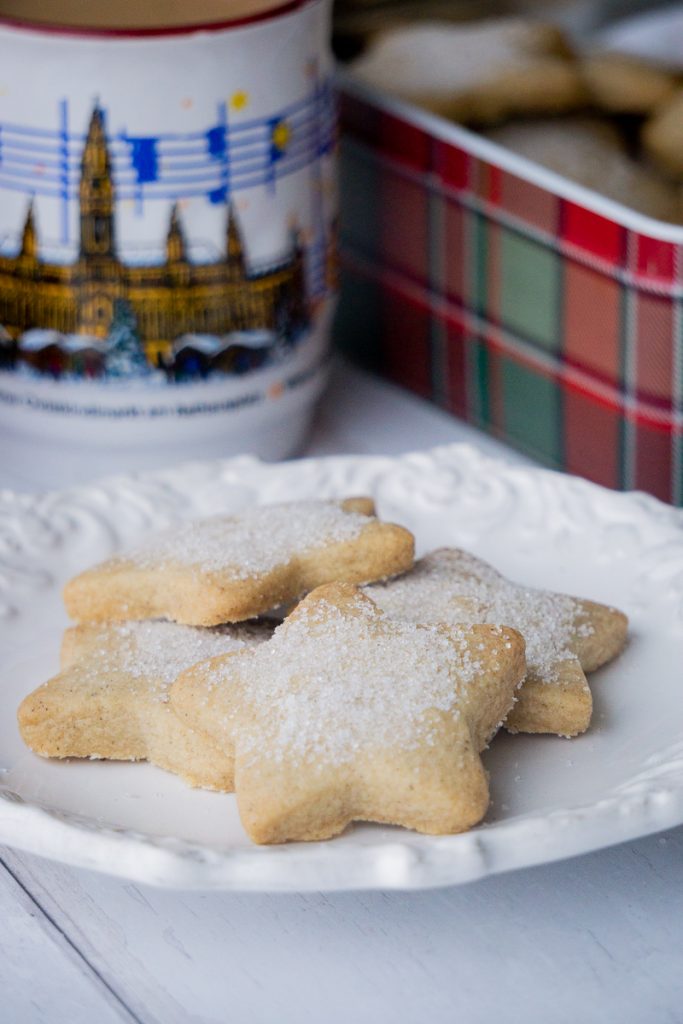 Spiced Christmas Shortbread Recipe - Biscuits on a plate with Christmas mug