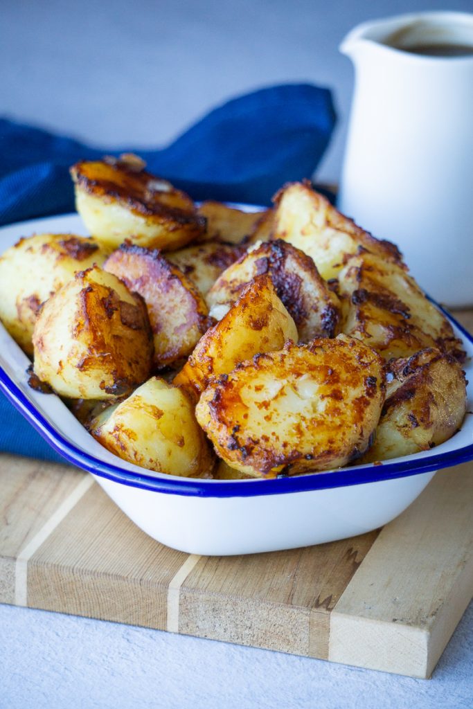 Marmite Roast Potatoes Recipe - Serving dish with gravy