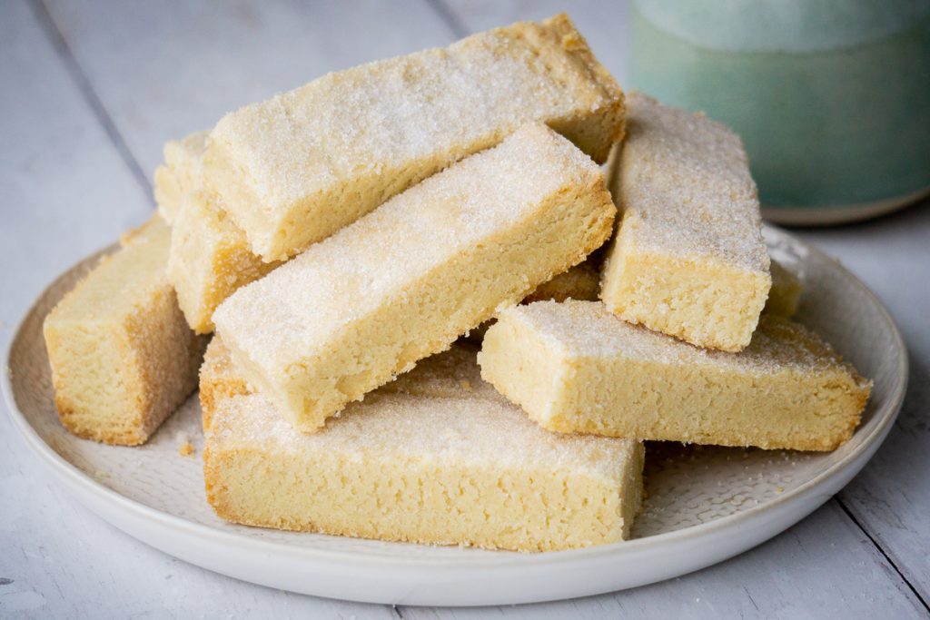 Classic Butter Shortbread Fingers Recipe - in a pile on a plate