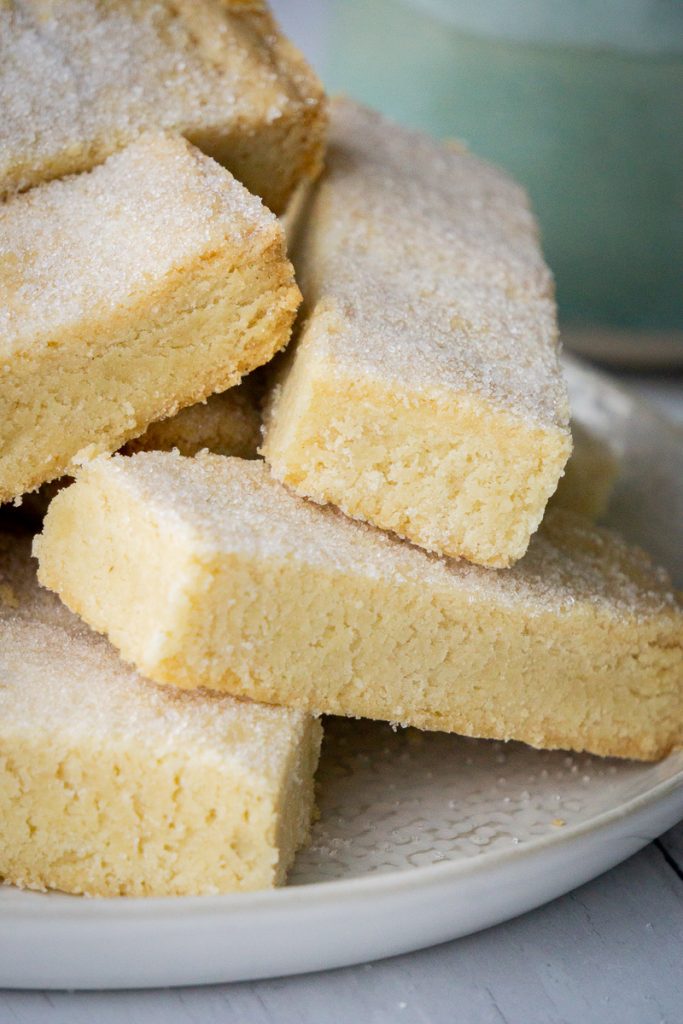 Classic Butter Shortbread Fingers Recipe - in a pile on plate